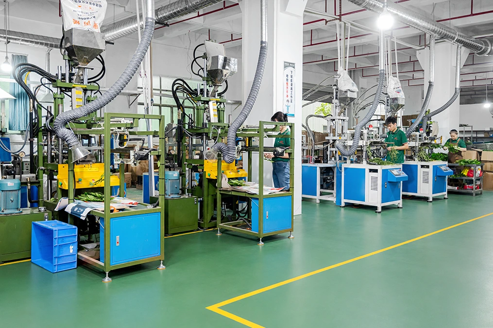 Grand Green dual-factory campus in Dongguan showing advanced plastics injection molding and botanical assembly workshop