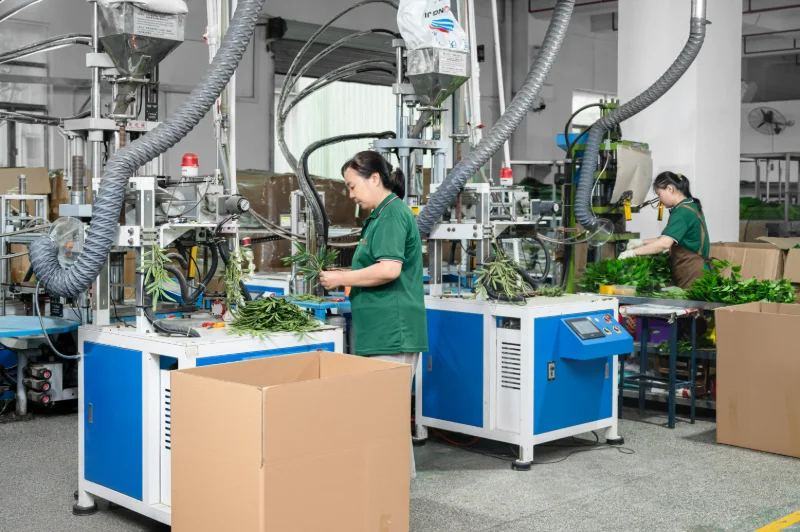 Finished artificial plants on assembly line