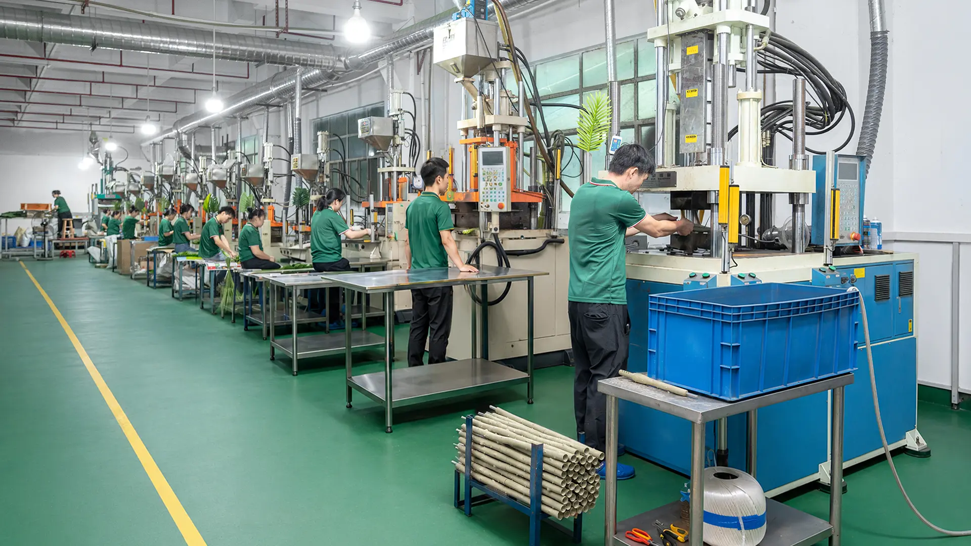Grand Green factory workshop panoramic view showing artificial plant production lines